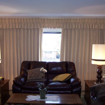 Anita's Interiors - a living room with leather furniture - Shades & Blinds Near Me - Tacoma, Washington Anita's Interiors - a living room with leather furniture - Shades & Blinds Near Me - Tacoma, Washington