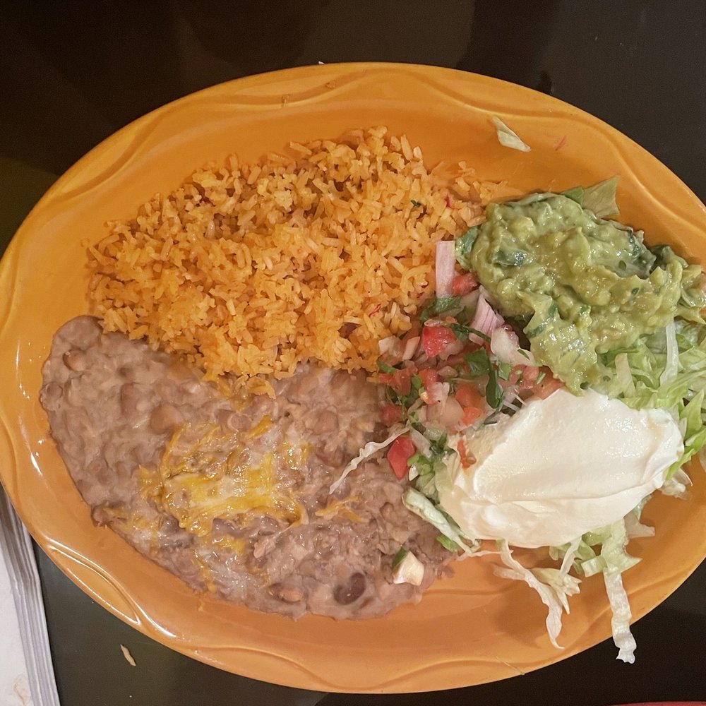Tequila Azteca Mexican Restaurant - Side plate for fajitas (rice, beans, lettuce, pico, and sour cream). - Sports Bars Near Me - Vero Beach, Florida Tequila Azteca Mexican Restaurant - Side plate for fajitas (rice, beans, lettuce, pico, and sour cream). - Sports Bars Near Me - Vero Beach, Florida