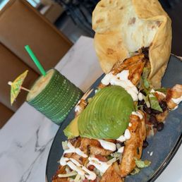 Piña colada and chicken taco salad. Piña colada and chicken taco salad.