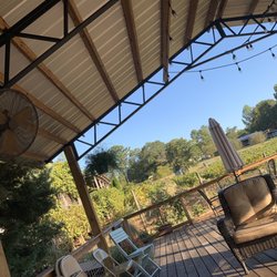 Hidden Meadow Vineyard - Back porch there is a wrap around one and 2 out back ! Very nice cozy and relaxing .