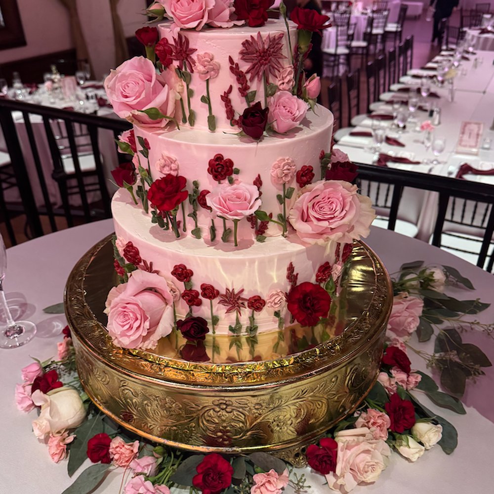 Some Crust Bakery - Our beautiful cake with butter cream flowers & real flowers. - Bakeries Near Me - Claremont, California Some Crust Bakery - Our beautiful cake with butter cream flowers & real flowers. - Bakeries Near Me - Claremont, California