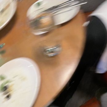Apple Blossom - Table seating arrangements are intimate and flame inducing - New American Near Me - Denver, Colorado