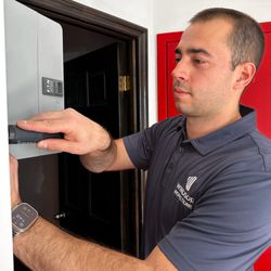 Windsor Inspections - Inspecting an electrical box to ensure proper wiring has been installed.