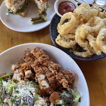 Fete - (Top) Smoked Ono salad sandwich, (middle) Maui onion rings, (bottom) Fete salad with crispy chicken. - New American Near Me - Honolulu, Hawaii