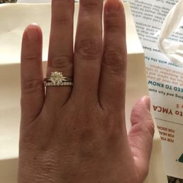1.42 carat round engagement ring and .98 carat round eternity band. 1.42 carat round engagement ring and .98 carat round eternity band.