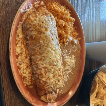 Pina Cocina & Cantina - Wet Burrito in Roja sauce. - Desserts Near Me - Raymond, Wisconsin