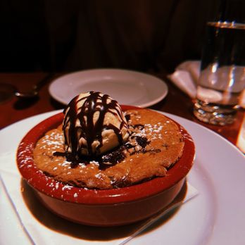 Lure Fishbar - Warm chocolate chip cookie topped with vanilla ice cream - Seafood Near Me - New York, New York Lure Fishbar - Warm chocolate chip cookie topped with vanilla ice cream - Seafood Near Me - New York, New York