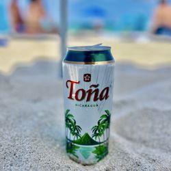Yambo Restaurant - Toña Nicaraguan lager, available in bottled and tallboy form.