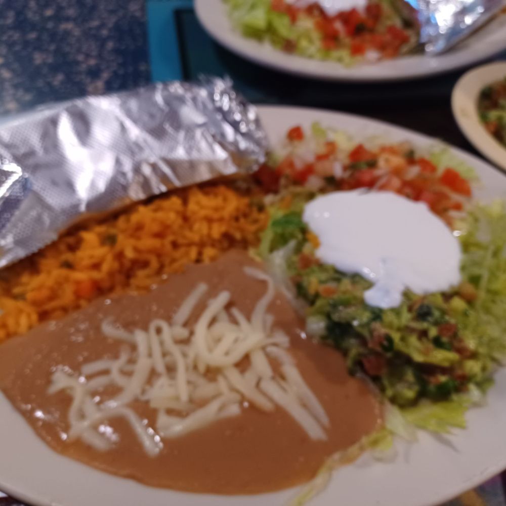 The sides that come w/your entree.Rice is good, beans are spicy and the guacamole is good.