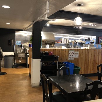 The Wayside Cafe - Near the back, facing the kitchen. They were playing fantastic tunes. Comfy setting. The food is phenomenal and oh so filling! - Vegan Near Me - Olympia, Washington