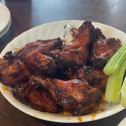 Dozen smoked chicken wings, medium Buffalo sauce Dozen smoked chicken wings, medium Buffalo sauce