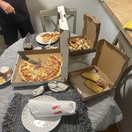 Chicken parmigiana hero, Hawaiian pizza, wings, garlic knots, extra sauce and garlic bread. Everything made to perfection.