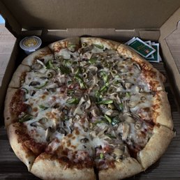 Create your own - XL Pizza. Mushrooms, green peppers and green olives. Create your own - XL Pizza. Mushrooms, green peppers and green olives.
