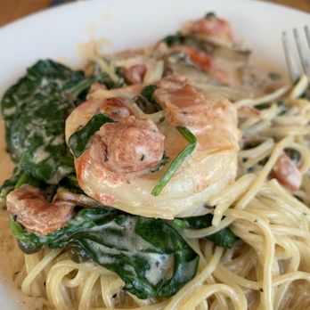 Rocco's - a plate of pasta with shrimp and spinach - Italian Near Me - Houston, Texas Rocco's - a plate of pasta with shrimp and spinach - Italian Near Me - Houston, Texas
