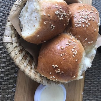 Husk - Warm dinner rolls with pork butter - American Near Me - Charleston, South Carolina Husk - Warm dinner rolls with pork butter - American Near Me - Charleston, South Carolina