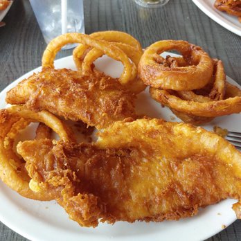 Davison Road Inn - Fish fry with onion rings. - New American Near Me - Lockport, New York