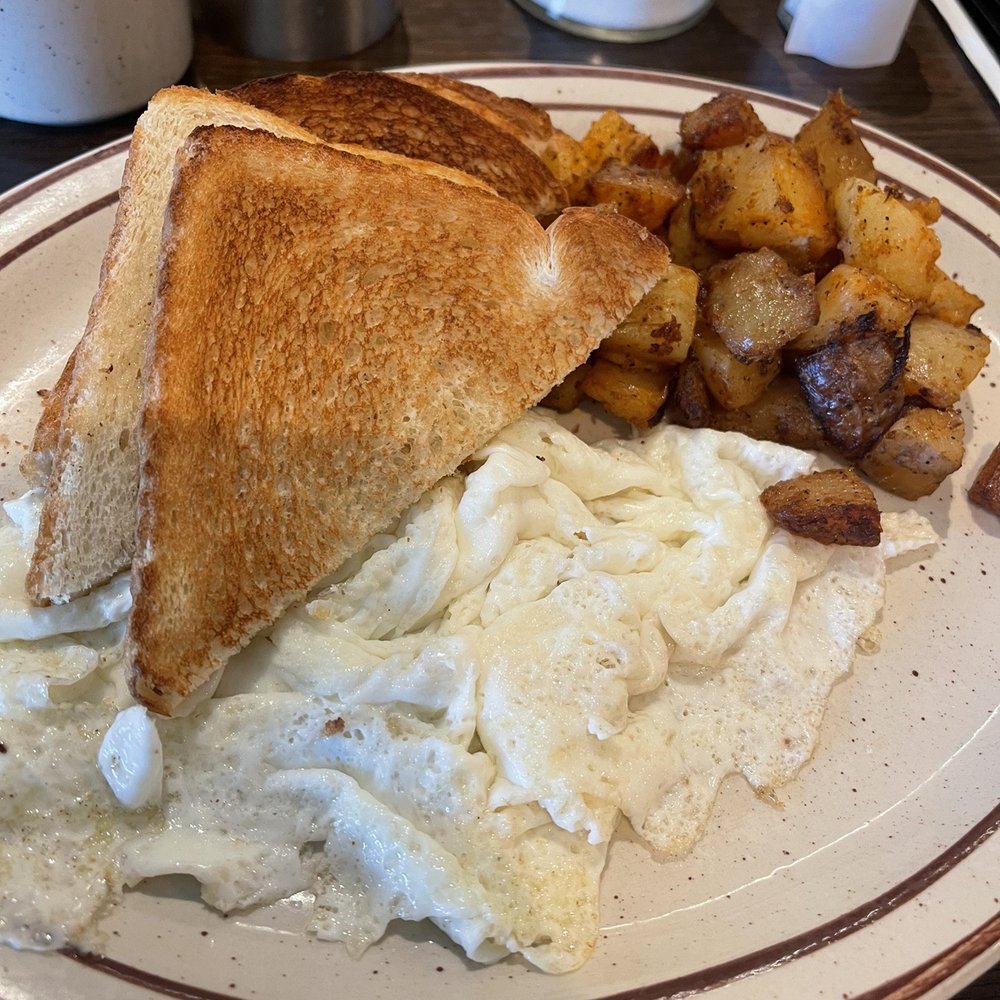 Egg whites w/ home fries and toast. Egg whites w/ home fries and toast.