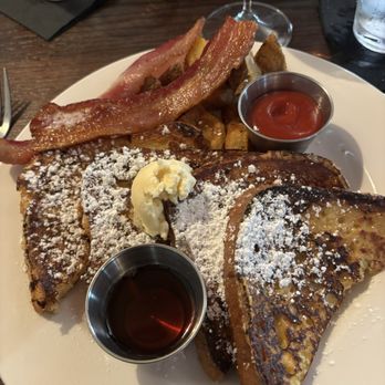 The Main House - Classic French Toast with a side of bacon - New American Near Me - Saint Charles, Missouri The Main House - Classic French Toast with a side of bacon - New American Near Me - Saint Charles, Missouri
