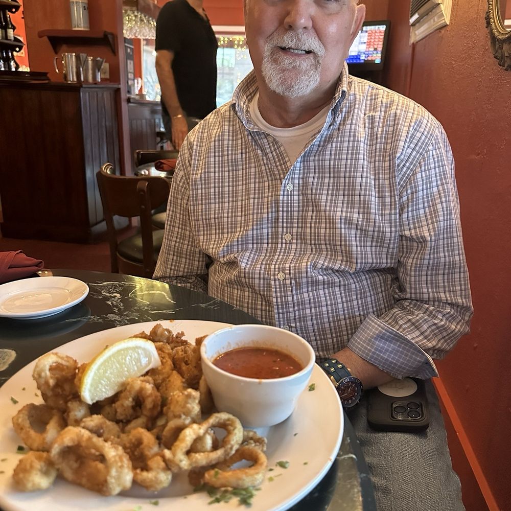 Café Trastevere - My handsome husband and our amazing calamari! Best calamari ever!! - Italian Near Me - Orlando, Florida Café Trastevere - My handsome husband and our amazing calamari! Best calamari ever!! - Italian Near Me - Orlando, Florida