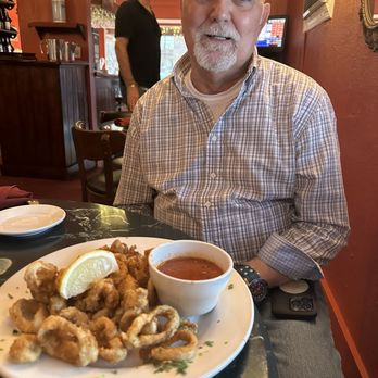 Café Trastevere - My handsome husband and our amazing calamari! Best calamari ever!! - Italian Near Me - Orlando, Florida Café Trastevere - My handsome husband and our amazing calamari! Best calamari ever!! - Italian Near Me - Orlando, Florida