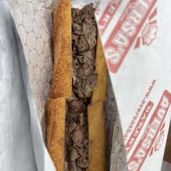 Aversa's Italian Bakery - Half roast beef sandwich served hot with sharp provolone.