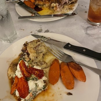 Mean Deans Local Kitchen - (Closest plate) Smothered Clucker, then (across the table) Rosemary Fig Chicken. Both with Maple Carrots and mmmashed potatoes! - Soup Near Me - Bradenton, Florida