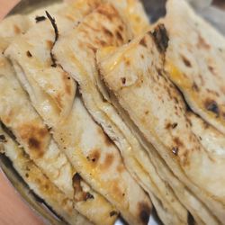 Ruchi’s Indian Cuisine - Cheese naan