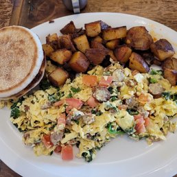 Spinach, tomatoes, turkey sausage scrambled no cheese. Home fries and english muffin YUM. Spinach, tomatoes, turkey sausage scrambled no cheese. Home fries and english muffin YUM.