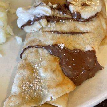 Broken Yolk Cafe - The only thing that made up to the experience and I Did give 2 stars.... Nutella crepe - Breakfast & Brunch Near Me - Orange, California Broken Yolk Cafe - The only thing that made up to the experience and I Did give 2 stars.... Nutella crepe - Breakfast & Brunch Near Me - Orange, California