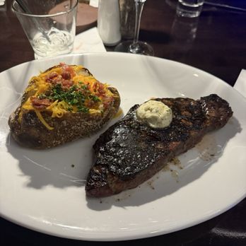 Kaluz - Wellington - NY Strip and a loaded baked potato. - New American Near Me - Wellington, Florida