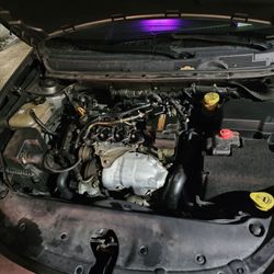 McGrath Chrysler Jeep Dodge Ram - My car without its engine cover the day I got it back