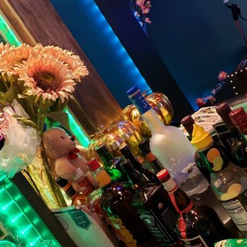 Diem Xua - bottles of alcohol and flowers - Vietnamese Near Me - Falls Church, Virginia Diem Xua - bottles of alcohol and flowers - Vietnamese Near Me - Falls Church, Virginia