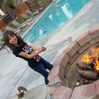 Millennial Realtors - My grand daughter roasting marshmallows in our beautiful back yard... - Real Estate Agents Near Me - Whittier, California Millennial Realtors - My grand daughter roasting marshmallows in our beautiful back yard... - Real Estate Agents Near Me - Whittier, California