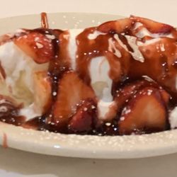 Georgine's - Vanilla ice cream Crepe , topped with strawberries