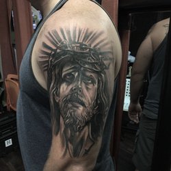 Seven Daggers Tattoo Studio - Done by antonio hooks