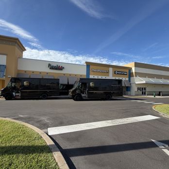 The UPS Store - Exterior with UPS trucks ready to go - Printing Services Near Me - Indian Harbour Beach, Florida The UPS Store - Exterior with UPS trucks ready to go - Printing Services Near Me - Indian Harbour Beach, Florida