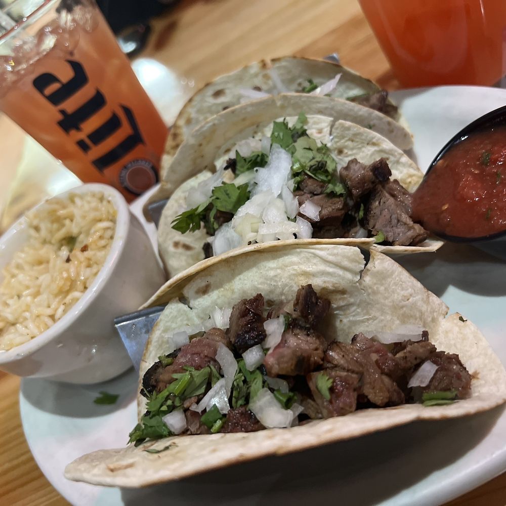 Steak tacos beans and rice