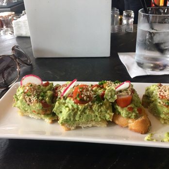 Earls Kitchen + Bar - Avocado Super Toast from happy hour menu $7  Super Yummy - Cocktail Bars Near Me - Plano, Texas