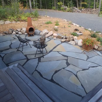 Lake Effect Builders - a patio with a fire pit - General Contractors Near Me - Washburn, Wisconsin Lake Effect Builders - a patio with a fire pit - General Contractors Near Me - Washburn, Wisconsin