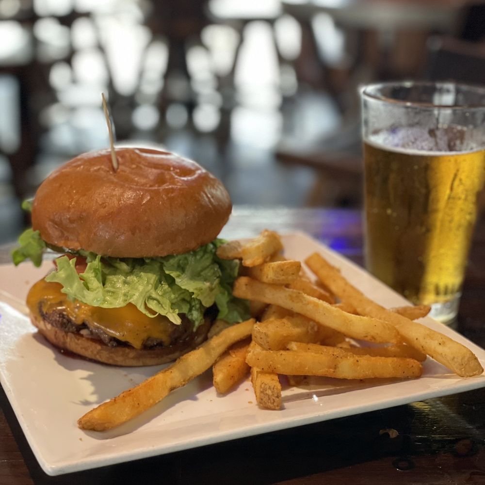 Boatyard Pub - Charbroiled pub Burger w/fries and leashless hazy beer - Bars Near Me - Ventura, California