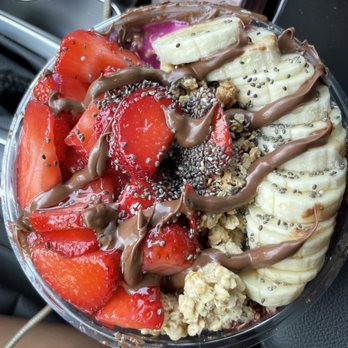 Playa Bowls - half nutella bowl with half pitaya. toppings: banana, nutella, honey, chia seeds, strawberry, and granola. - Acai Bowls Near Me - Kensington, Maryland Playa Bowls - half nutella bowl with half pitaya. toppings: banana, nutella, honey, chia seeds, strawberry, and granola. - Acai Bowls Near Me - Kensington, Maryland
