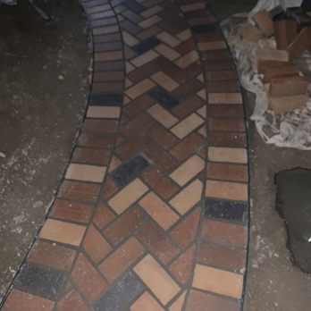 Dominguez Construction - Completed herringbone walkway path - General Contractors Near Me