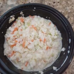 KFC - Coleslaw  pitiful half full they can't even give you a decent amount for your money A shame poor management