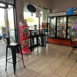 Cafe Tapioca - People line up to buy lotto tickets, boba, bahn mi, or scratch offs from the machine on the right.