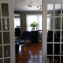 Aesthetics Brows & Lashes Lounge - Looking into the hairstylist room from the waiting room area