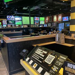 Buffalo Wild Wings - Empty on a Friday and the host is screwing around in the back