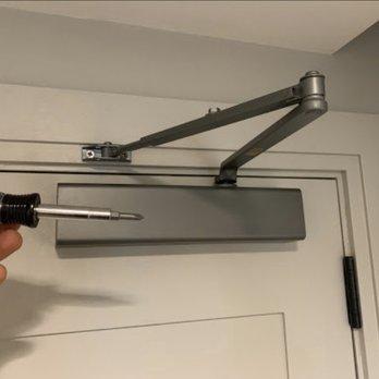 Nolita Locksmith - fresh installation and make new holes on wood door providing door closer to slime the door very smoothly. - Keys & Locksmiths Near Me - New York, New York Nolita Locksmith - fresh installation and make new holes on wood door providing door closer to slime the door very smoothly. - Keys & Locksmiths Near Me - New York, New York