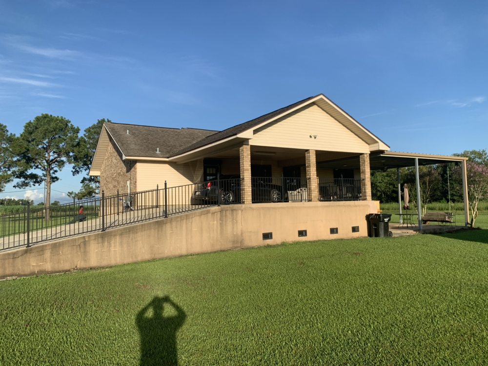 Slide of Pelican Roofing