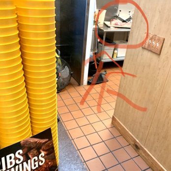 Dickey's Barbecue Pit - The meat sitting out exposed near cleaning equipment - Barbeque Near Me - Asheville, North Carolina