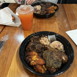 Jerk Chicken & Beef Oxtails combo with Festival bread and Guava juice